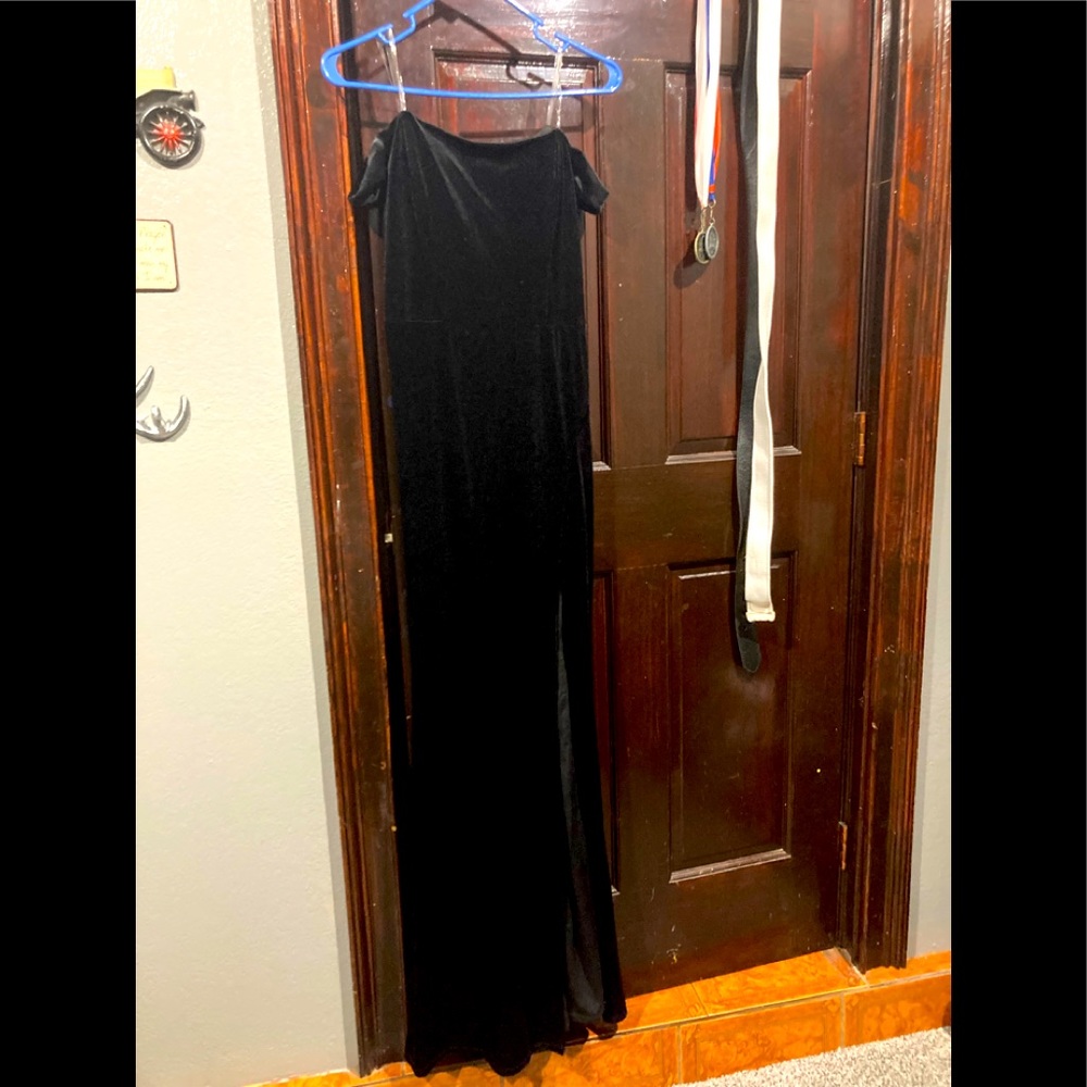 Off-shoulder black thigh slit dress